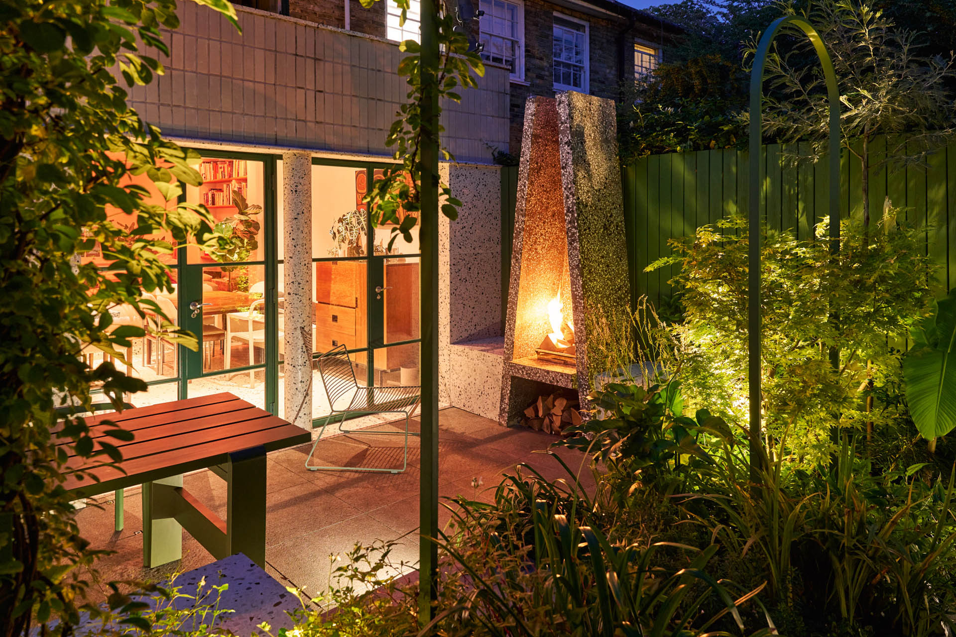 how to light your garden - beautifully lit garden and patio area